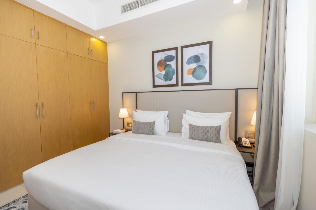 Platinum Coast Hotel Apartments Fujairah Luaran gambar A bedroom at the hotel