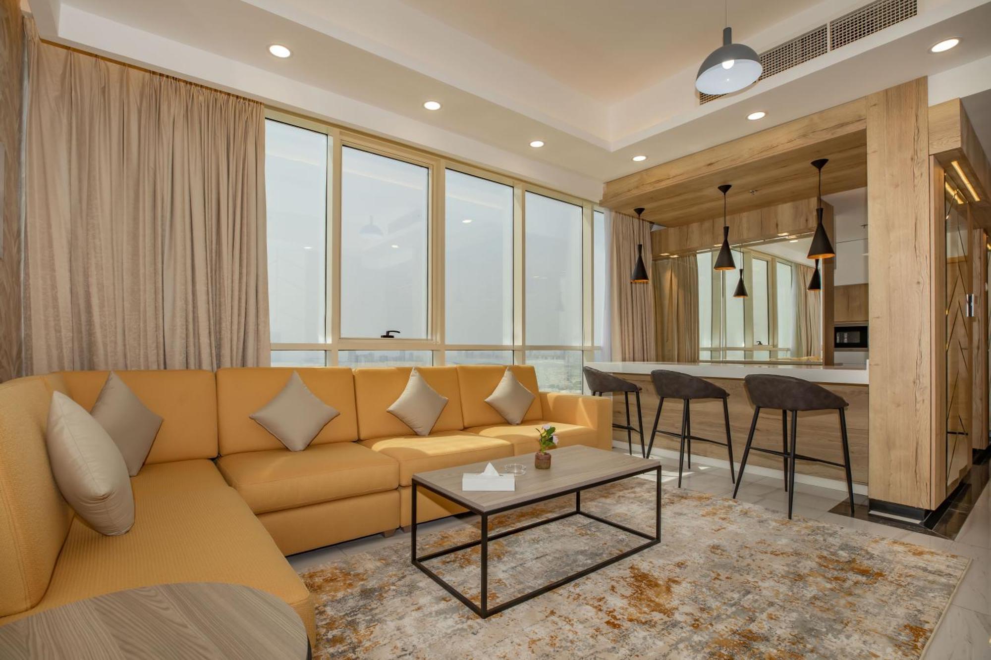 Platinum Coast Hotel Apartments Fujairah Bilik gambar A living room in a suite at the hotel